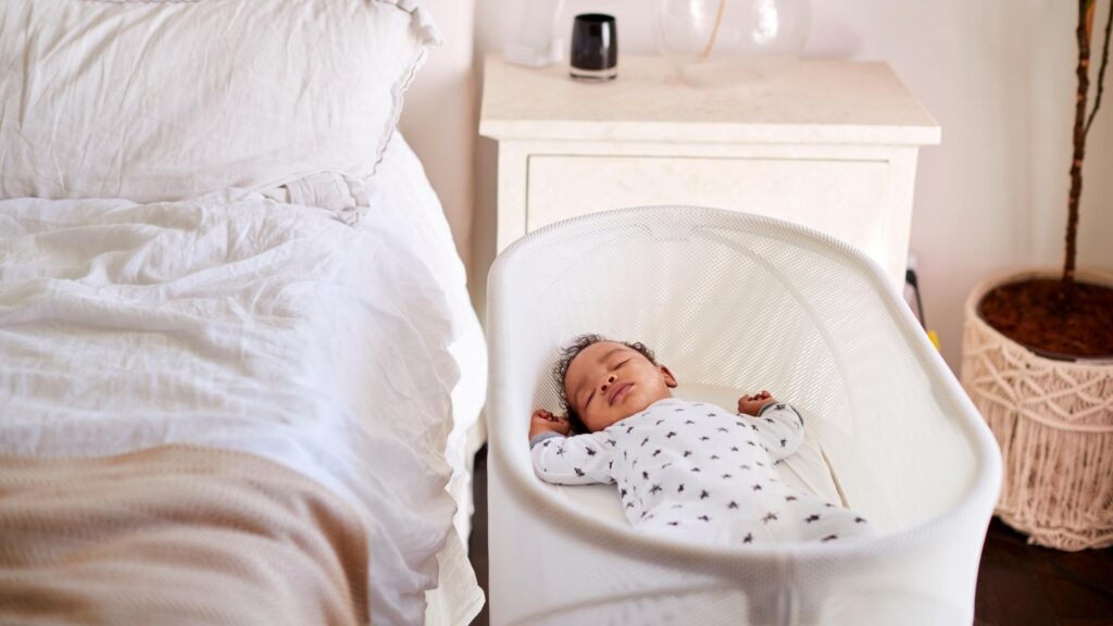 3 Month Old Sleeping Next to parent's bed in a snoo bassinet